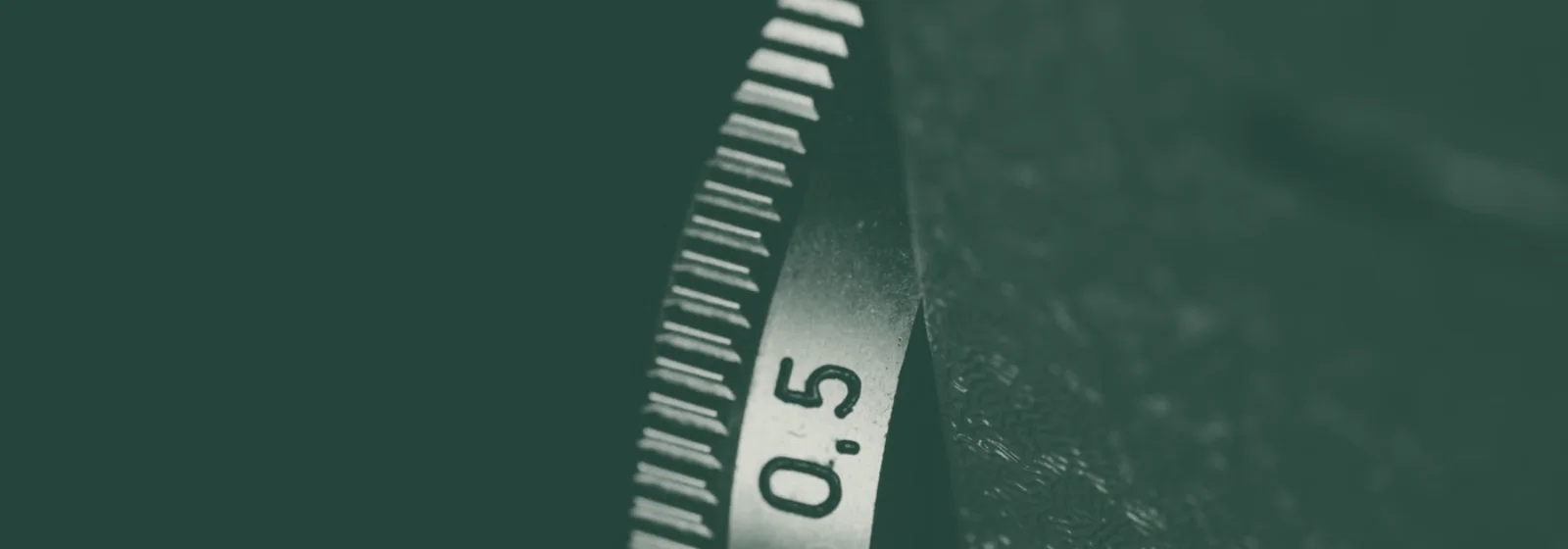 Macro photograph of a precision measuring dial marked 0.5